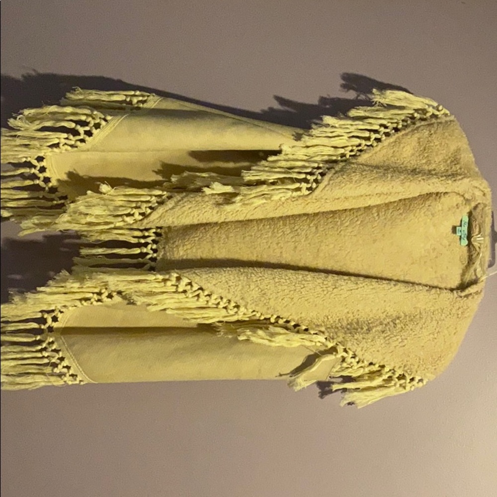 Sleeveless tan sweater/ poncho
